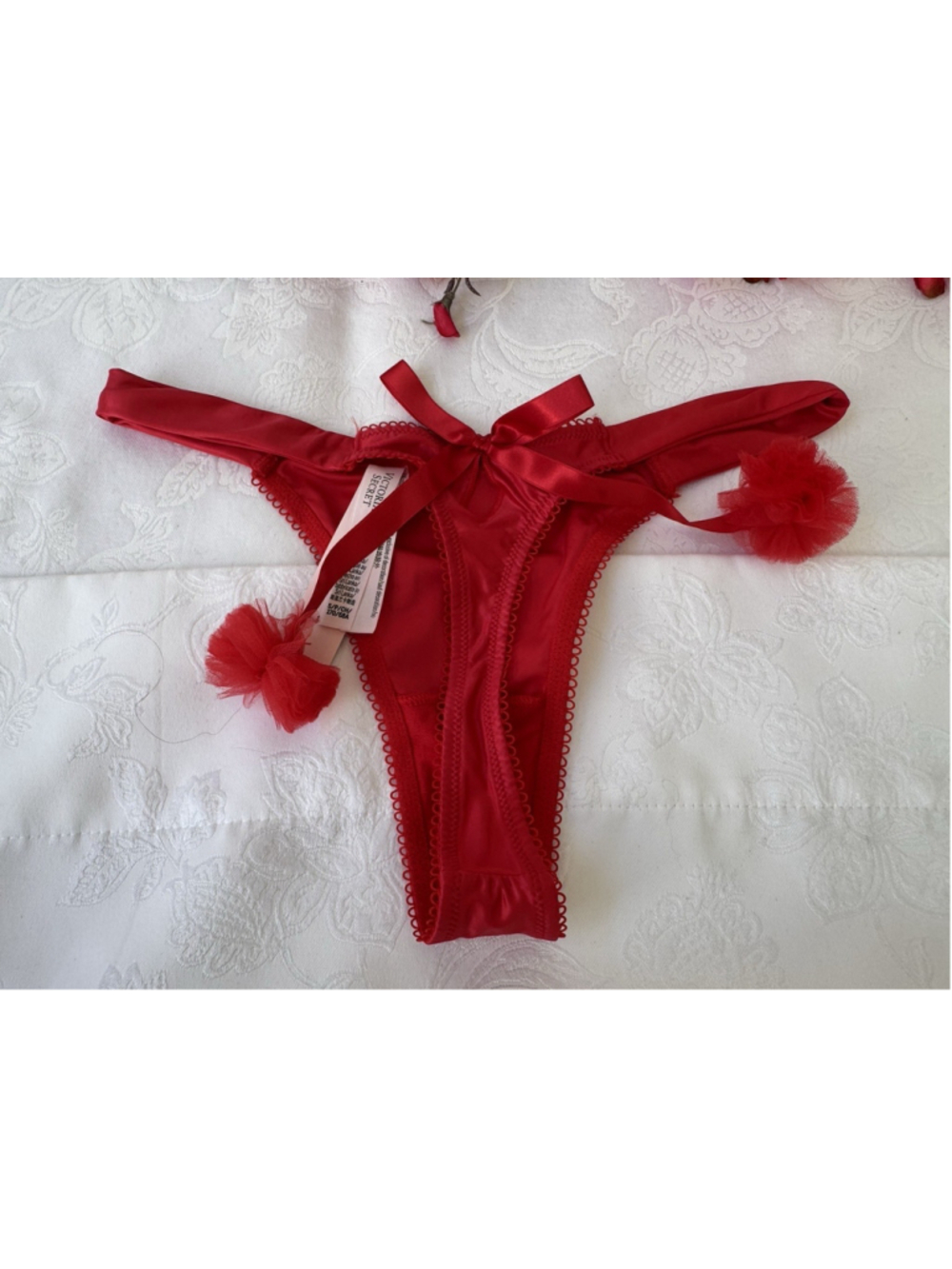 VICTORIA'S SECRET L SILKY RED STRING THONG PANTIES W SEXY POM POM BOWS NWT